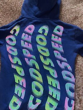 Blue V-Neck Sweater with Neon Wave Graphic